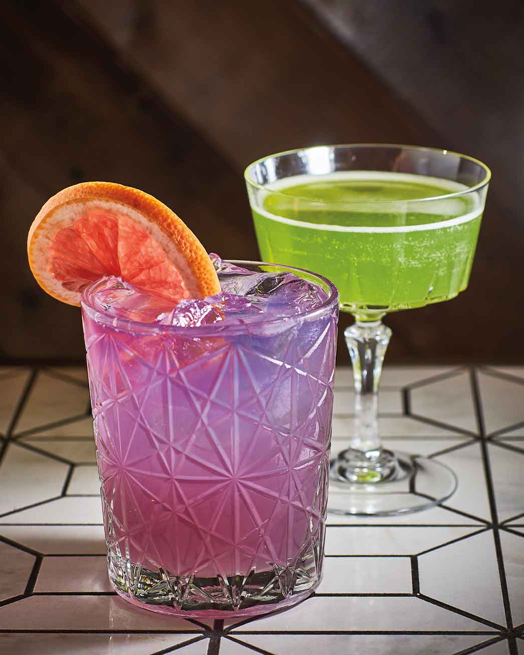 Mountain cocktails from Where the Buffalo Roam include the High Violet purple tumbler and Misty Mountain Hop. Photo by Damian Lamartine