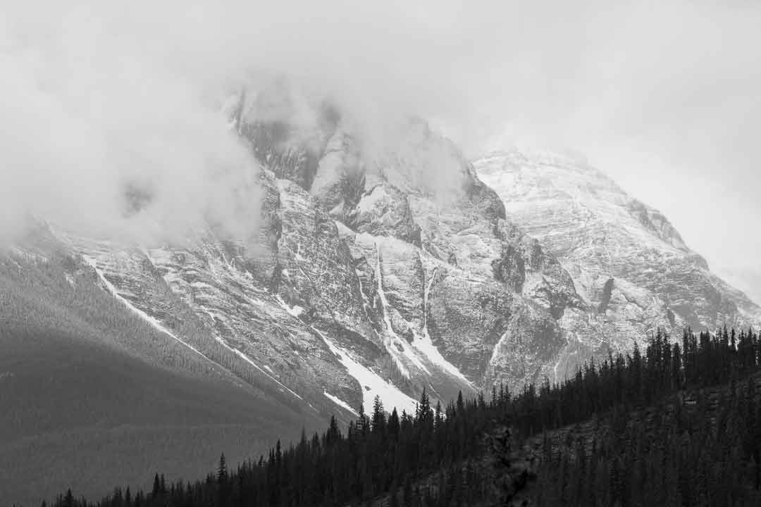 Mountain shrouded with clouds by Jack Hawkins