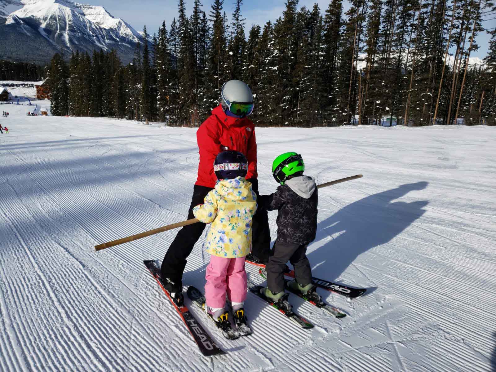 Jessica teaching the kids how to glide during their ski lesson at Lake Louise Ski Resort