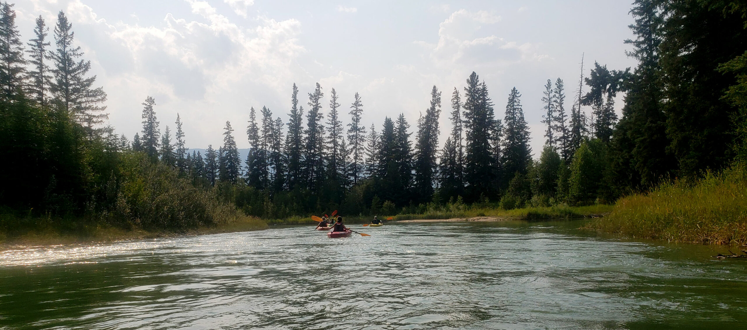 A group on a kayak tour from Fairmont Hot Springs Resort