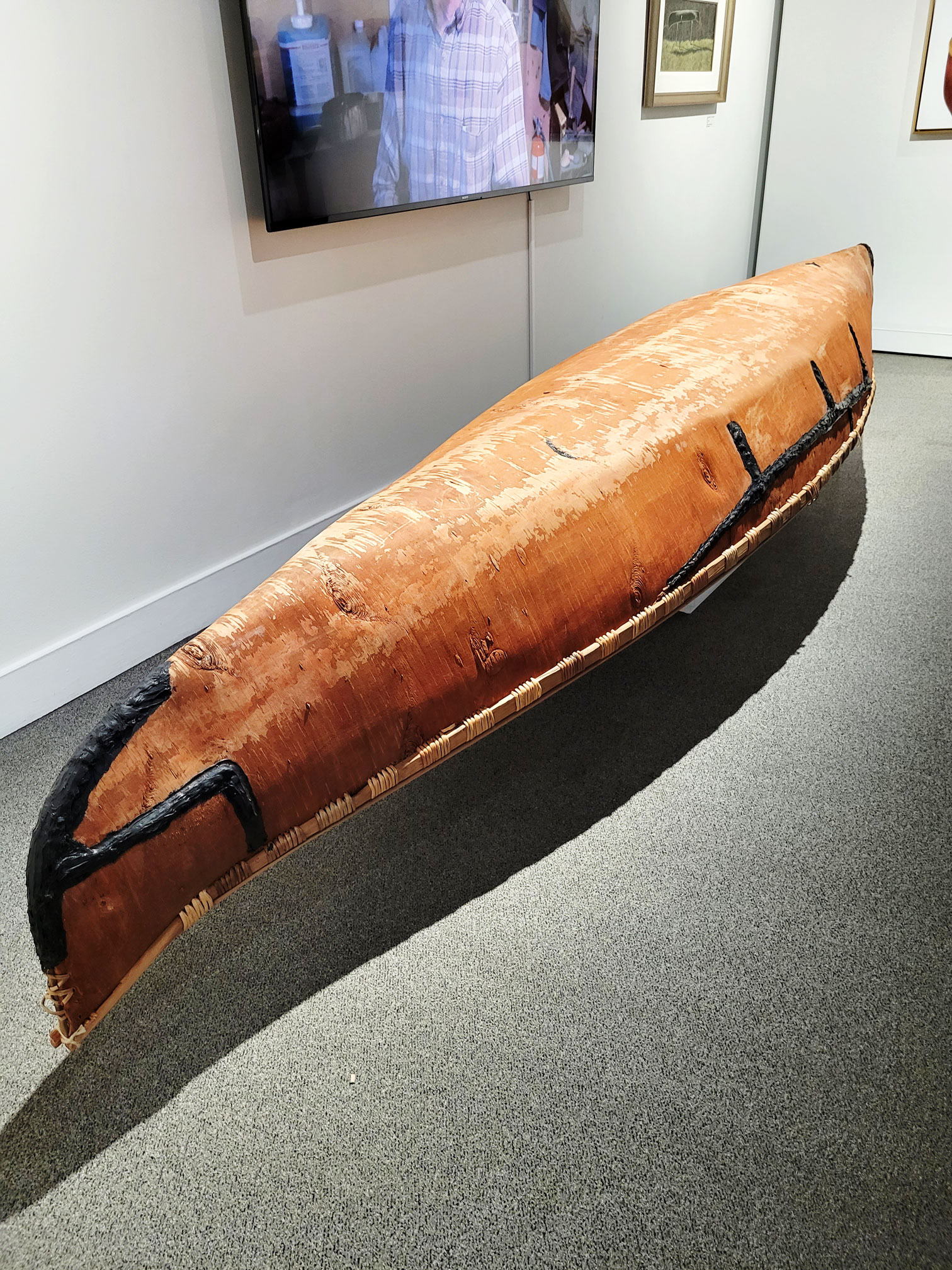 Birch Canoe by Don Gardner. 14' canoe made from a single piece of birch bark. Part of the McCreath Collection on display at the Whyte Museum of the Canadian Rockies.