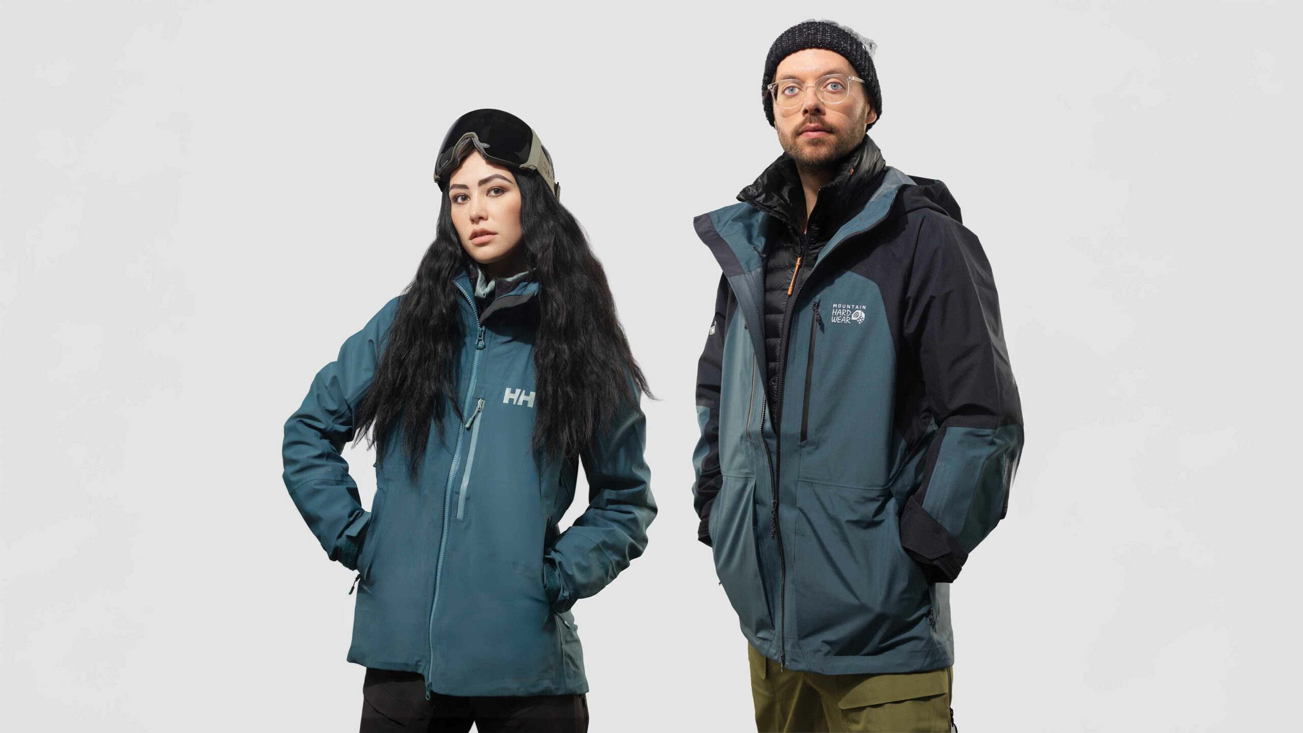 Models Enya and Darren wear looks from Helly Hansen and Bear Street Outfitters in this photo by Damian Lamartine. They are showing off looks that show winter style from the city to the slopes.