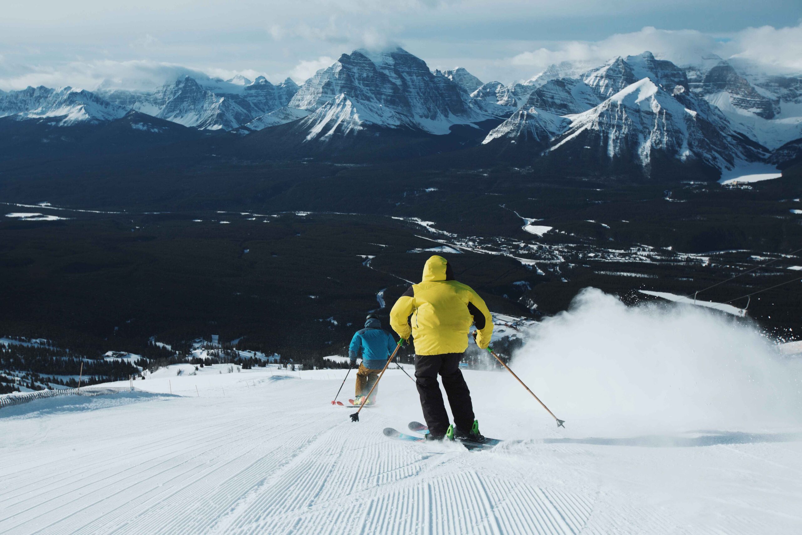 Two people ski at Lake Louise Ski Resort