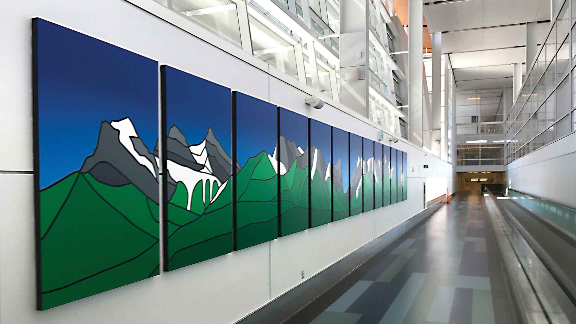 A mountain vista artwork from Jason Carter at the Calgary International Airport